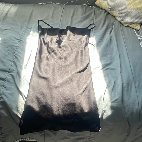 Garage Dresses & Skirts - Garage black mini dress, open back, never worn, tags still on. Size: Large